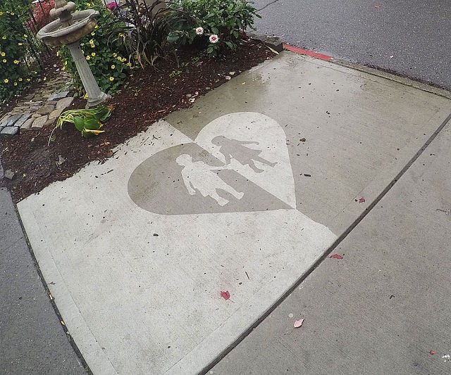 rain activated street art