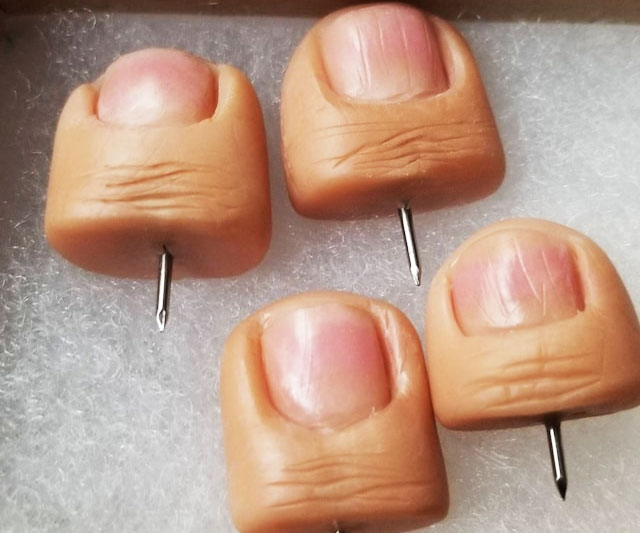 Realistic Human Thumb Tacks